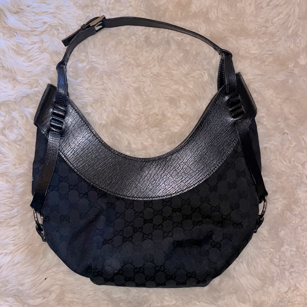 Gucci half moon bag in black with silver hardware